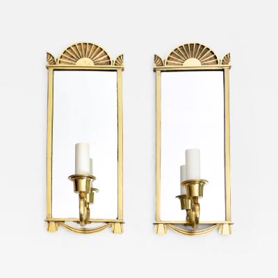 Pair of Swedish Grace era polished brass mirrored sconces 