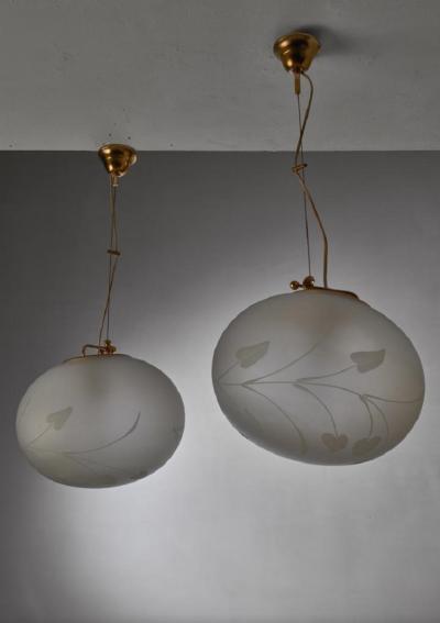 Pair of Swedish adjustable pendants with floral motif