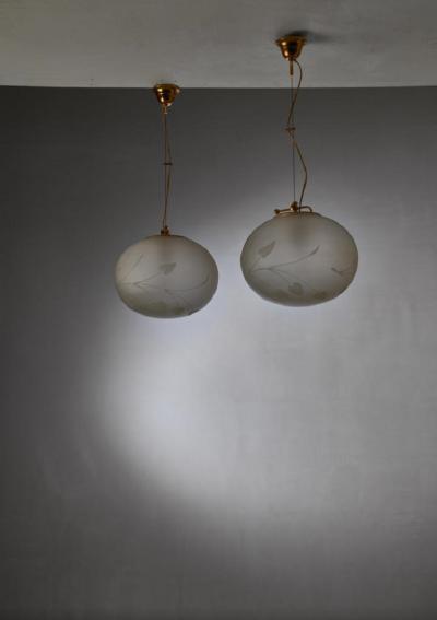 Pair of Swedish adjustable pendants with floral motif