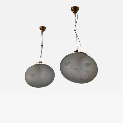 Pair of Swedish adjustable pendants with floral motif