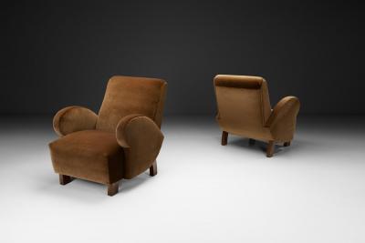 Pair of Upholstered Armchairs with Geometric Armrests Europe ca 1950s