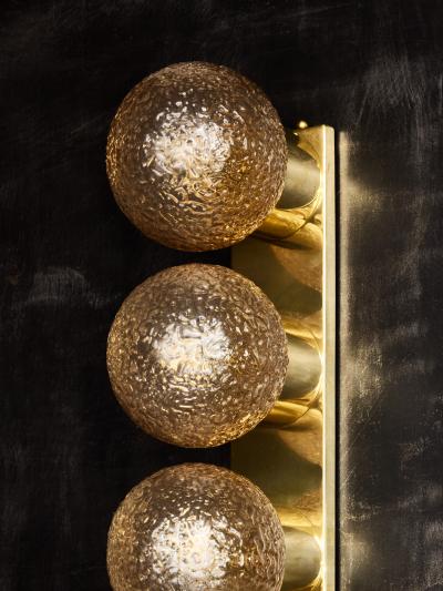 Pair of Vertical Brass and Smoked Textured Glass Globe Wall Sconces