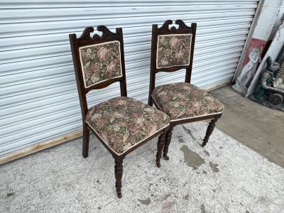Pair of Victorian Parlor chairs with casters on front legs