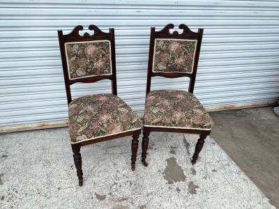 Pair of Victorian Parlor chairs with casters on front legs