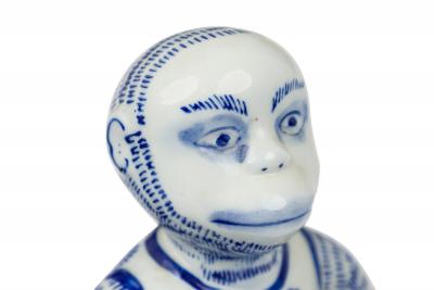 Pair of Vintage Chinese Style Blue and White Monkey Candlestick Holder