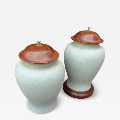 Pair of Wood and Heavy Plastic Urns