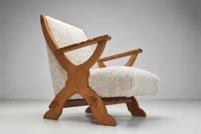 Pair of Wood and Sheepskin Lounge Chairs Europe Mid 20th Century