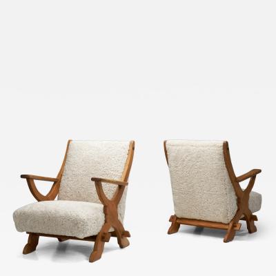 Pair of Wood and Sheepskin Lounge Chairs Europe Mid 20th Century