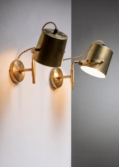 Pair of adjustable brass wall lamps