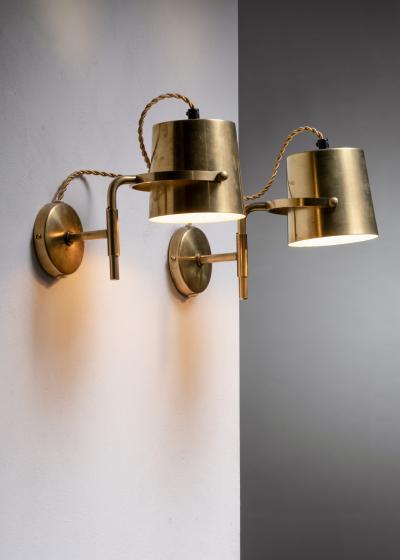 Pair of adjustable brass wall lamps
