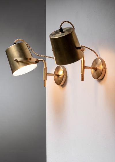 Pair of adjustable brass wall lamps