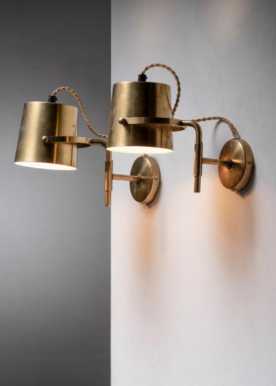 Pair of adjustable brass wall lamps