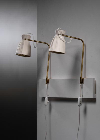 Pair of adjustable wall lamps