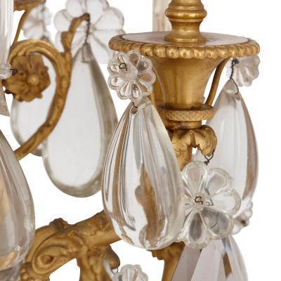 Pair of antique 19th Century French gilt bronze and crystal candelabra