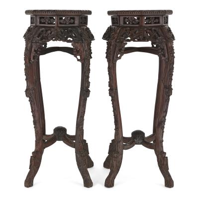 Pair of antique Chinese hardwood and veined marble stands