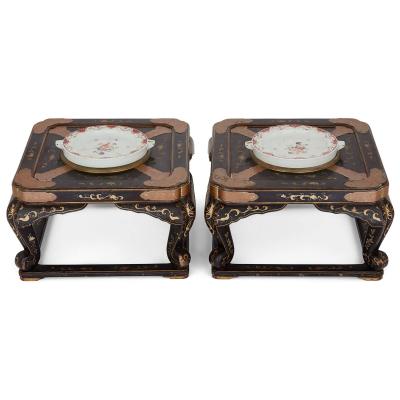 Pair of antique Chinese lacquered low tables with porcelain warming plates