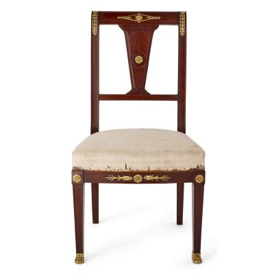 Pair of antique French Empire style mahogany and gilt bronze chairs
