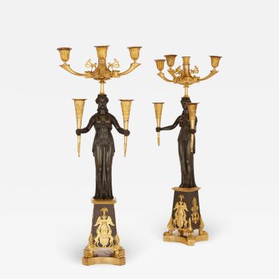 Pair of antique French patinated and gilt bronze candelabra