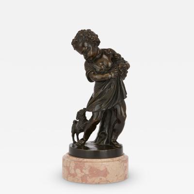 Pair of antique bronze figures of cherubs and animals