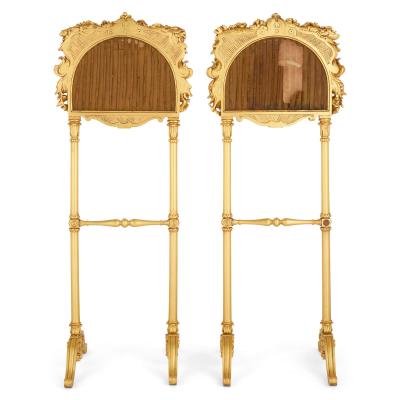 Pair of antique embroidered carved giltwood fire screens