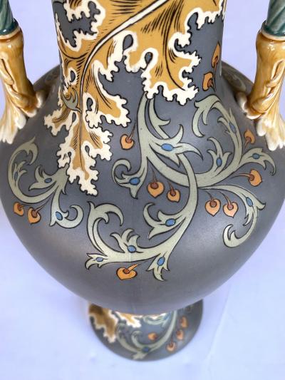 Pair of art nouveau Mettlach pottery vases with incised markings to underside
