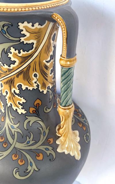 Pair of art nouveau Mettlach pottery vases with incised markings to underside