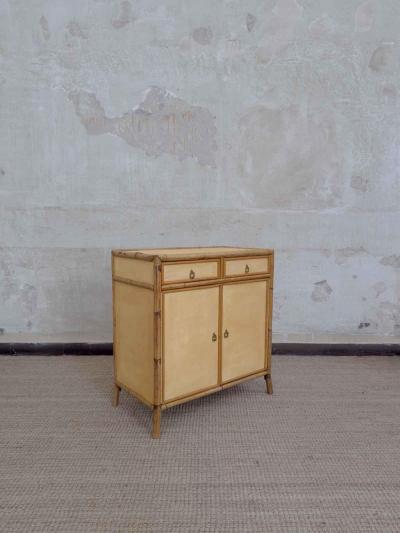 Pair of bamboo cabinets covered in raffia