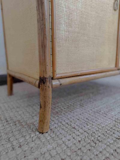 Pair of bamboo cabinets covered in raffia