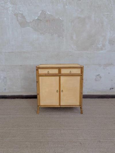 Pair of bamboo cabinets covered in raffia