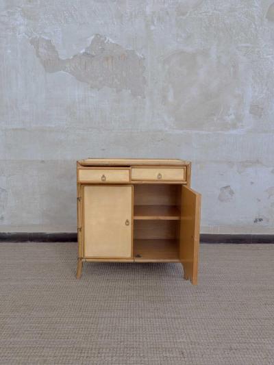 Pair of bamboo cabinets covered in raffia