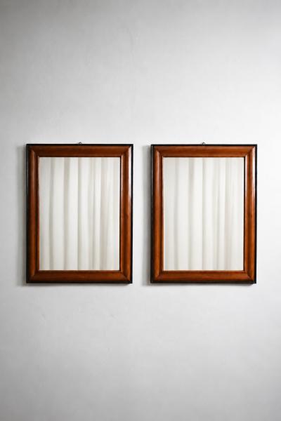 Pair of bicolor wood and ebonised wood mirrors XIXth c 