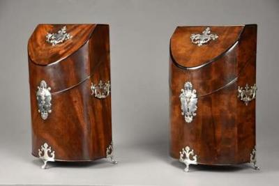 Pair of bow front mahogany cutlery boxes with silver mounts of superb patina
