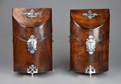 Pair of bow front mahogany cutlery boxes with silver mounts of superb patina