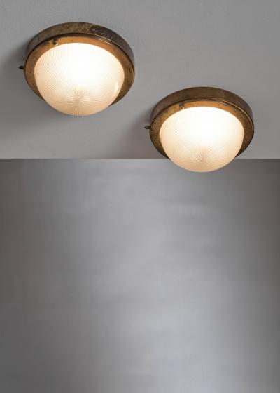 Pair of brass and glass ceiling lamps