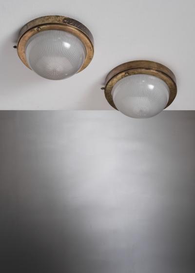 Pair of brass and glass ceiling lamps
