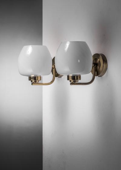 Pair of brass and glass wall lamps