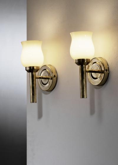 Pair of brass and glass wall lamps