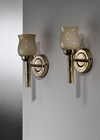 Pair of brass and glass wall lamps