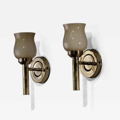 Pair of brass and glass wall lamps