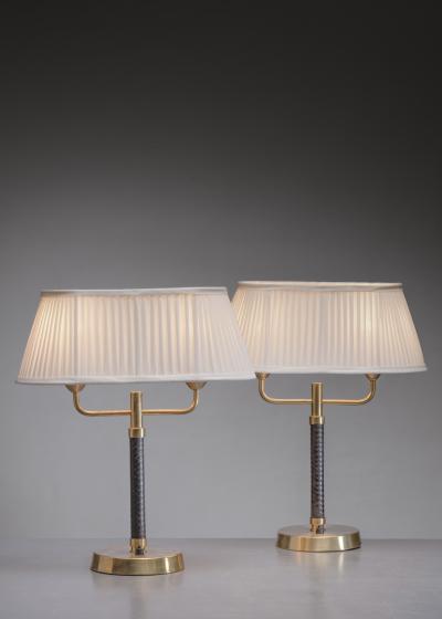 Pair of brass and leather table lamps