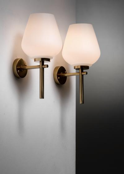 Pair of brass and opaline glass wall lamps