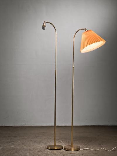Pair of brass floor lamps