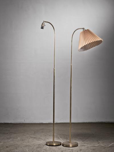 Pair of brass floor lamps