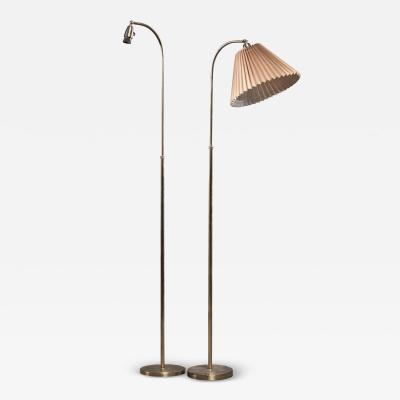 Pair of brass floor lamps