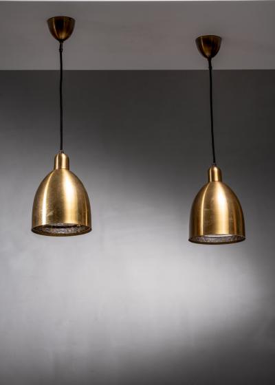 Pair of brass pendant lamps