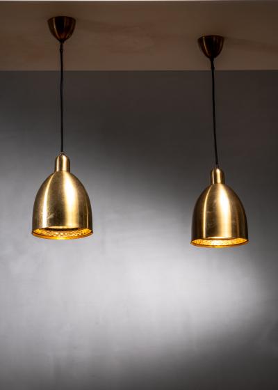 Pair of brass pendant lamps
