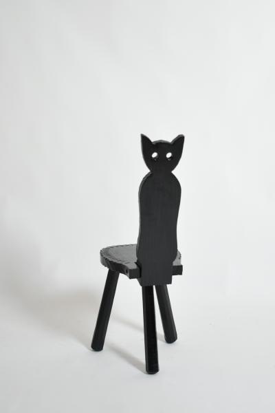 Pair of brutalist ebonised wood owl chairs 1960s 