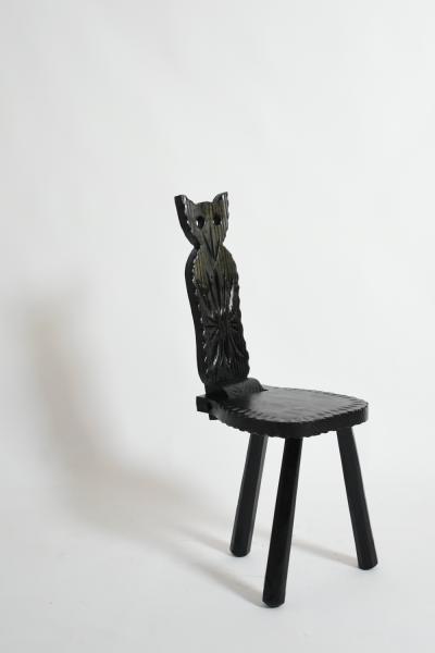 Pair of brutalist ebonised wood owl chairs 1960s 