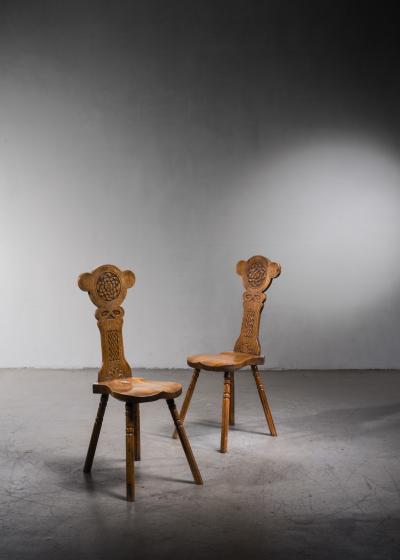 Pair of carved oak dining chairs