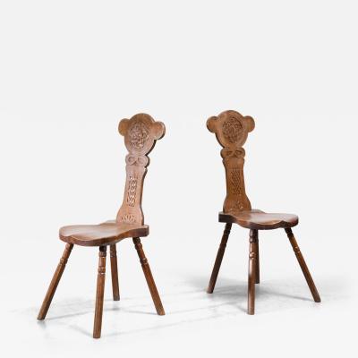 Pair of carved oak dining chairs Sweden